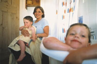 Essentials Social Energy Tariff image: Woman with children at bathtime
